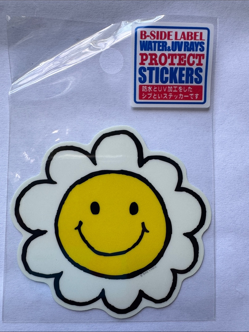 Yellow Smiley Daisy Protect Sticker